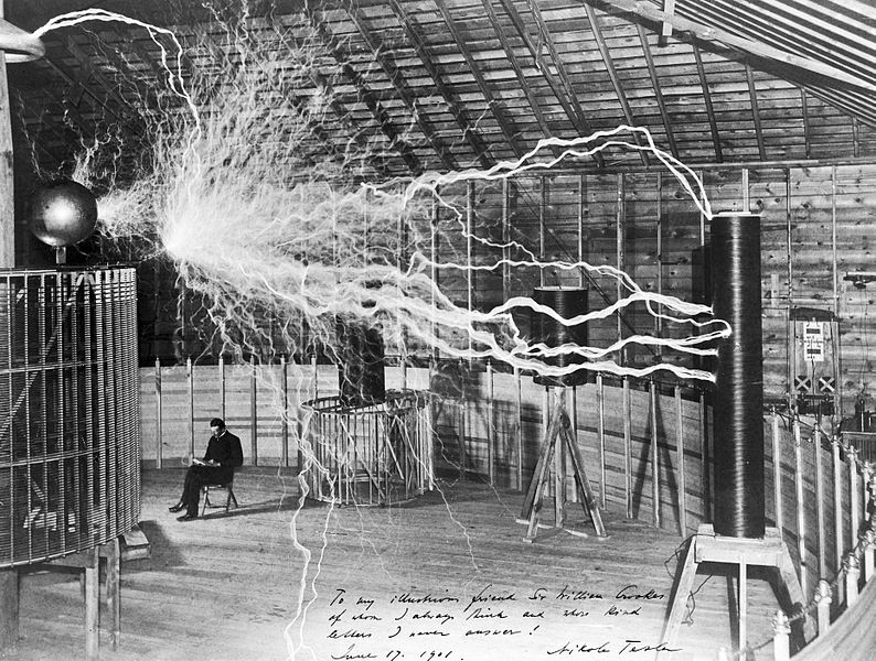 Nikola Tesla with equipment